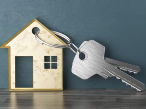Mortgage, investment, real estate and property concept - close up of house keys. 3d rendering illustration